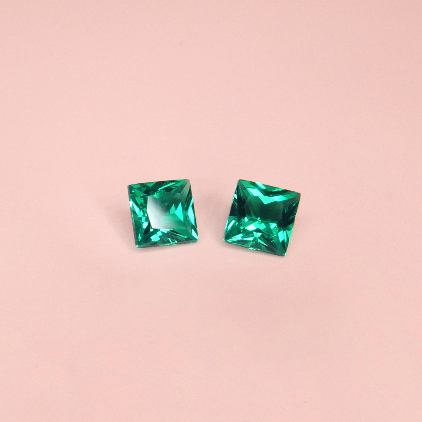 small pair of square-princess cut lab-grown emeralds