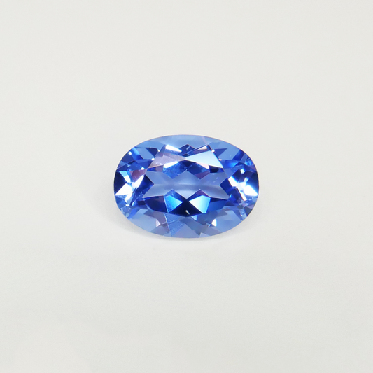 light blue oval hand-cut lab-grown sapphire